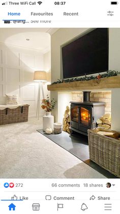 a living room with a fireplace and tv above the fire place in front of it