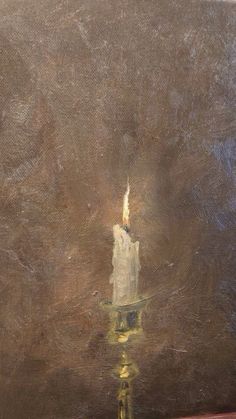 a painting with a candle in the middle