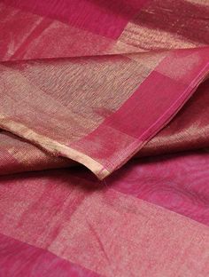 A pink handwoven chanderi dupatta with zari weaving. Colour - Pink Fabric - Cotton silk/Chanderi Wash Care - Dry Clean only Length - 94 inches, Width - 44 inches Estimated Delivery - 15-20 Days Luxury Pink Dupatta With Zari Weaving, Pink Handloom Tussar Silk Dupatta, Pink Slub Silk Dupatta, Pink Slub Silk Dupatta With Zari Work, Pink Slub Silk Dupatta With Self Design, Pink Slub Silk Traditional Wear For Celebration, Pink Cotton Silk Traditional Wear For Celebration, Pink Handloom Raw Silk Traditional Wear, Pink Handloom Katan Silk Dupatta