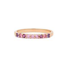 Nine gorgeous semi-precious & precious stones exude flawlessness in this 14K gold ring. The gemstones are set to create a tone-on-tone stream of color that feels subdued, yet vibrant. This is 0.3 Ct and comprised of 14K solid gold. Rose Gold Multi-stone Jewelry With Pink Sapphire, Rose Gold Multi-stone Pink Sapphire Jewelry, Pink Multi-stone Amethyst Ring, Pink Amethyst Ring With Pink Sapphire And Accent Stones, Pink Amethyst Ring With Gemstone Accents, Pink Amethyst Ring In Fine Jewelry Style, Pink Amethyst Ring Fine Jewelry, Pink Amethyst Gemstone Ring, Pink Multi-stone Sapphire Promise Ring