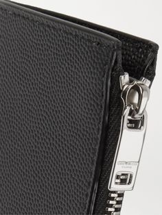 SAINT LAURENT's holder is a sleek way to keep your business and credit cards in check. Crafted from pebble-grain leather and fitted with a zipped pocket for coins, it is an everyday essential. Saint Laurent Collection, Leather Cardholder, Leather Billfold, English Shop, Billfold Wallet, Black Pebbles, Black Wallet, Card Holder Leather, Mr Porter