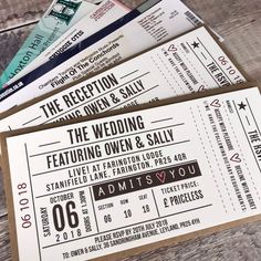 some tickets are laying on top of each other and ready to be used as wedding favors