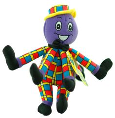 a purple stuffed animal wearing a colorful hat and striped pants with one leg spread out