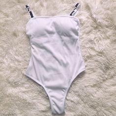 Nwt White Size Small Sporty Bodysuit For Beach In Spring, White Sporty Bodysuit For The Gym, White Sporty Bodysuit For Swimming, White Bodysuit For Swimming, White Lined Swimwear For Sports, Sporty White Bodysuit For Poolside, White Sporty Bodysuit For Summer, Sporty White One-piece Bodysuit, White One-piece Sports Bodysuit