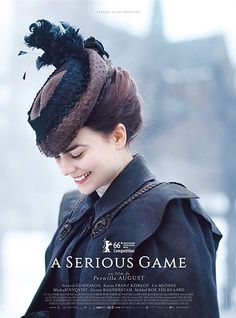 the poster for as serious game shows a young woman in a black coat and hat