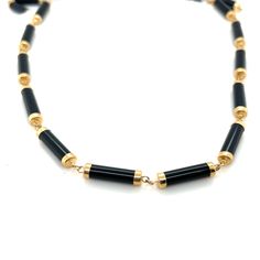 "Yellow Gold Black Onyx Necklace Perfect for everyday wear a special occasion and makes the perfect gift.  Details:                  14KT Yellow Gold                16\" Long                 Weight 13.5 Grams                Onyx Measures 4mm X 15mm                 Comes in a presentable gift box" Black Single Strand Necklace For Gift, Formal Black Bracelet With Adjustable Chain, Black Jewelry With Adjustable Chain For Formal Occasions, Classic Black Necklace For Formal Occasions, Formal Black Single Strand Necklaces, Formal Single Strand Black Necklace, Formal Black Single Strand Necklace, Formal Onyx Necklace With Black Enamel, Formal Black Beaded Necklace