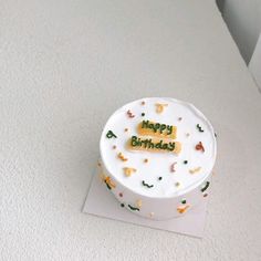 a birthday cake with the words happy birthday on it