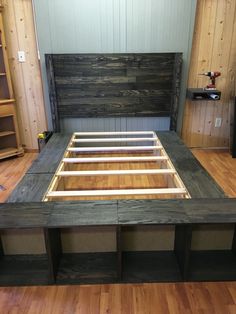 the bed frame is made out of wood