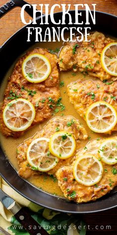 chicken with lemons and sauce in a skillet