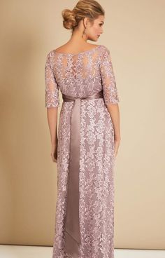 Made from beautiful vintage-inspired sheer lace, the Asha in Lilac is a stunning floor-length gown. From Baby Shower to Bridesmaid, with a stylish boat neckline, sheer ¾ length sleeves and dramatic full skirt that drapes over your bump, you’ll look and feel amazing at the most special of occasions. •Premium embroidered tulle in lilac •Floor length gown with ¾ sleeves •Empire waist with gentle gather over the bump •Sheer neckline and sleeves •Fully lined with premium jersey •Add a sash to define Wedding Dress With Fitted Bodice And Boat Neck, Lace Mother Of The Bride Dress With 3/4 Sleeves, Mother Of The Bride Dress With Illusion Neckline, Fitted Lace Dress For Wedding With 3/4 Sleeves, Fitted 3/4 Sleeve Lace Dress For Wedding, Fitted Lace Dress With 3/4 Sleeves For Weddings, Fitted 3/4 Sleeve Lace Wedding Dress, Mother Of The Bride Dress With Lace Bodice, Elegant Lace Dress With 3/4 Sleeves For Weddings