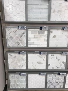 the shelves are filled with white tile