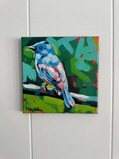 a painting of a blue bird sitting on a branch