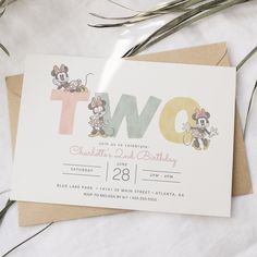 two year old birthday party with mickey mouse and minnie mouse on it's card