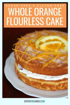 a cake with orange slices on top and the words, whole orange flourless cake