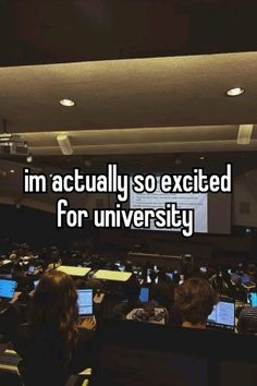 an auditorium full of laptops with the words i'm actually so excited for university