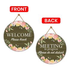 two hanging signs with flowers on them and the words welcome, please knack in progress