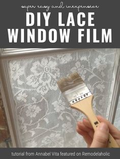 a person holding a paintbrush in front of a window with the words diy lace window film on it