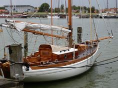 a sailboat is docked in the water