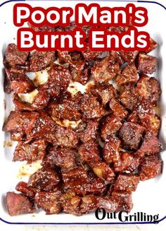 a white plate topped with meat covered in sauce and text that reads, poor man's burnt ends