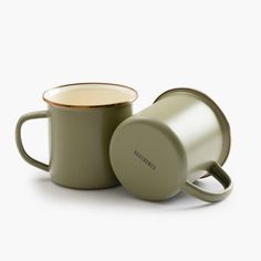 two green mugs sitting next to each other