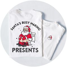 --- Christmas Santa Mascot T-Shirt ---  Design features a Front and Back print of original artwork, in a Distressed ink stamp style. On the back of the t-shirt is a print of a toon-inspired Santa Sitting on the Toilet with text "Santa's Busy Making Presents" On the Front is a pocket style print of Santa's face.  --- KEY FEATURES --- 🎨 Original Artwork by myself. 🏡 Made to order in-house, ensuring a unique piece just for you. ✨ Lightly distressed print to capture that vintage vibe. 🌿 Ringspun Cartoon Tshirt, Digital Printer, Santa Face, Womens Style, Funny Xmas, Xmas Shirts, Tshirt Funny, Style Tops, Ink Stamps