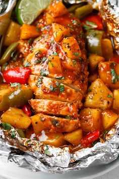 chicken with pineapples, peppers and jalapenos in foil