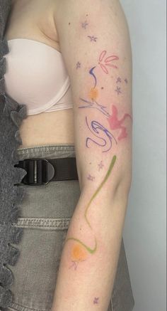 a woman with a tattoo on her arm