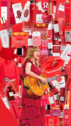 a woman in a red dress is holding a guitar and surrounded by many different items