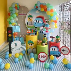 a birthday party with balloons and decorations