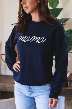 Our favorite Mama sweatshirts are back! We are loving this soft mama graphic sweatshirt. Long sleeve sweatshirt. Unisex fit. You can go wrong sizing up for a more relaxed fit. 50% cotton 50% Polyester. Available in White w/ black ink, navy with white ink and burgundy with white ink. The back is plain no text. Model is wearing a size Small. She is 5'6". 130lbs. Bust: 34" Waist 26" Hips 36" Everyday French Terry Tops With Letter Print, Everyday Long Sleeve Tops With Lettering, Long Sleeve Tops With Lettering For Everyday, Cozy French Terry Top With Letter Print, Everyday Sweatshirt With Lettering And Crew Neck, Everyday Crew Neck Sweatshirt With Lettering, Everyday Fleece Tops With Letter Print, Fleece Tops With Letter Print, Navy Cotton Sweatshirt With Embroidered Logo