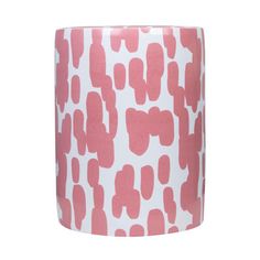 a roll of pink and white washi tape on a white background with red dots