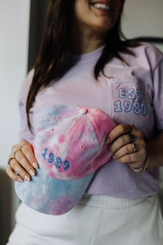 Were you established in 1989 or in you 1989 era? We are too! Show your love for your favorite era with this tie-dye ball cap that has a nostalgic and fun feel 1989 Merch, Blue Bonnets, Barnes And Noble, Ball Cap, Say Hello, Are You The One, Tie Dye, Cotton Blend, Hats