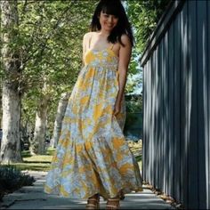 New With Tag Cotton Bloggers Favorite Yellow White Floral Printed Yellow Tiered Maxi Dress For Vacation, Yellow Tiered Maxi Dress For Summer, Yellow Maxi Dress With Ruffle Hem, Yellow Ruffle Hem Dress For Day Out, Yellow Dress With Ruffle Hem For Day Out, Yellow Dress With Ruffle Hem For Brunch, Yellow Maxi Sundress With Ruffles, Yellow Floral Cotton Maxi Dress, Yellow Ruffled Maxi Sundress