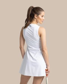 Sophisticated and sporty, our performance dress delivers on form and function from the court to the clubhouse. This sleek sleeveless stunner sports princess seams on stretch fabric at the front and back for a flawless fit. Built from cooling, wicking materials with UV protection, it's built to last through every match. Style: 10748 Classic White Dress, Performance Dresses, Sophisticated Dress, Princess Seams, Cute Swimsuits, Comfy Sweaters, Exposed Zipper, Womens Size Chart, Quarter Zip Pullover