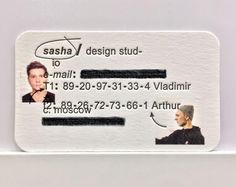 a close up of a business card with two people on the front and one person on the back