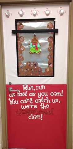 a door decorated with gingerbread cookies and saying run as fast as you can, you can't catch us