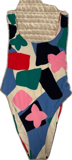 Multicolor Color Block Bodysuit For Pool, Multicolor Color Block Bodysuit For Poolside, Playful White Printed Swimwear, Playful White One-piece Swimwear, White Color Block Bodysuit For The Beach, Multicolor Sleeveless Bodysuit For Vacation, Sleeveless Multicolor Bodysuit For Vacation, Playful Spring Bodysuit, Casual Printed Multicolor Bodysuit