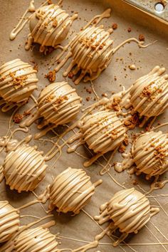 chocolate covered donuts with caramel drizzle on top