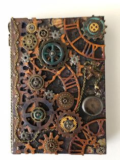 an altered clock with gears and chains on it