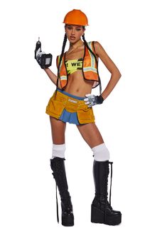 a woman dressed in construction gear and holding a camera