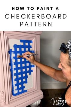 a woman is painting a checkerboard pattern on a cabinet with blue paint and the words, how to paint a checkerboard pattern