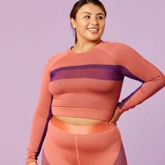 Fabletics | Tory Cropped Seamless Long-Sleeve Top Size: Large (Model Is Wearing A Large And Is 5’7”) Condition: Nwt Color: Hot Peach/Royal Purple Seamless Free Yourself In Our Second-Skin Seamless Fabric Styles Made With Our Lightest Compression! Designedi To Be Flexible, Breathable And Lightweight, This Lounge-Worthy Material Takes You From Studio Sessions To Sunday Strolls. Purple Sportswear Top For Workout, Pink Long Sleeve Activewear For Light Exercise, Pink Long Sleeve Activewear For Workout, Purple Moisture-wicking Tops With Medium Support, Purple Crew Neck Athleisure Activewear, Purple Stretch Sporty Tops, High Stretch Seamless Purple Tops, Purple Seamless Tops For Gym, Purple Stretch Sportswear Tops