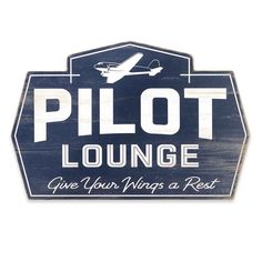 a sign that says pilot lounge give your wings a rest