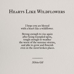 an open book with some writing on the cover and words below it that say, hearts like wildflowers