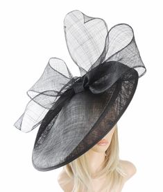 2015 Hats By Cressida British Birds Collection Barn Owl Fascinator Hat Gorgeous extra large sinamay flat hat trimmed with a modern take on a bow. Measures 48cm wide or about 19 inches We can make this in many different colours. If you prefer the bow to be a different colour to the base just state this when you pay. On a headband. Headband Colour: We always try and match the band to the fascinator. If we cant do this the band colour will be Black. If you dont wish a black band please supply an al Black Hat For Spring Events, Black Costume Hats And Headpieces For Summer Events, Black Summer Costume Hats And Headpieces For Events, Black Summer Costume Hats For Events, Black Top Hat For Summer Events, Black Boater Hat For Races, Black Boater Hat For Royal Ascot Party, Black Boater Hat For Kentucky Derby Party, Black Boater Hat With Short Brim For Party