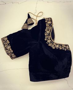 Hand embroidered ready made velvet saree blouse / crop top/stitched saree blouse usa / black saree blouse/ hand embroidered blouse/zardosi blouse/velvet saree blouse/ pure silk blouse/ black velvet maggam work blouse        It is very true that a perfect blouse is the one which makes your saree look stand out !! If you find one of such a style that you have been wanting to have then dont let it go !! we carry such unique trending blouses that instantly add a stylish look to any saree !!     Well..!! we understand that you may not get in your desired size/pattern, here you go with customization according to your size/pattern which we can deliver in 1-2 weeks of time period !!      Here is a beautiful pure velvet Hand embroidered saree blouse in black color that has heavy intricate embossed Elegant Black Velvet Blouse, Elegant Embroidered Velvet Choli, Black Velvet Blouse For Party, Black Velvet Party Blouse, Black Bollywood Blouse With Intricate Embroidery, Velvet Unstitched Blouse For Wedding, Elegant Unstitched Velvet Blouse Piece, Unstitched Velvet Saree Blouse Piece, Velvet Choli With Intricate Embroidery