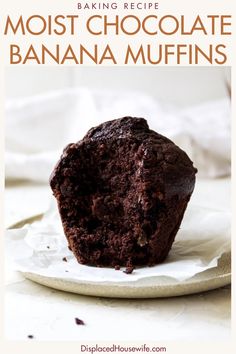 a chocolate muffin sitting on top of a white plate with the words baking recipe moist chocolate banana muffins