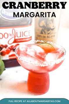 a close up of a drink in a glass on a table