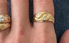 Beautiful antique snake ring in 18K yellow gold.  Ring has double snake heads with three little old cut diamonds on each head.  Weighs approximately 6 grams and is an approximate 7-1/2.  Stackable! Hallmarks rest at the top underside - A crown and an '18' purity mark.   I believe this can be resized by a skilled jeweler since the hallmarks won't be harmed.  Purchased from Sweden and was told it dates to the late 1800s and has the crown hallmark is for Sweden. Please see all photos for more details.  I'm happy to answer any questions and send more photos upon request. Formal Yellow Gold Snake Ring With Single Cut Diamonds, Formal Yellow Gold Snake Ring, Gold Snake Ring With Diamond Accents For Anniversary, Formal Yellow Gold Snake Ring With Diamond Accents, Antique Gold Snake Ring For Formal Occasions, Gold Snake-shaped Diamond Ring For Anniversary, Owl Ring, Dog Clip, Snake Ring