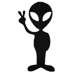 an alien is making the peace sign with his hand and standing in front of him